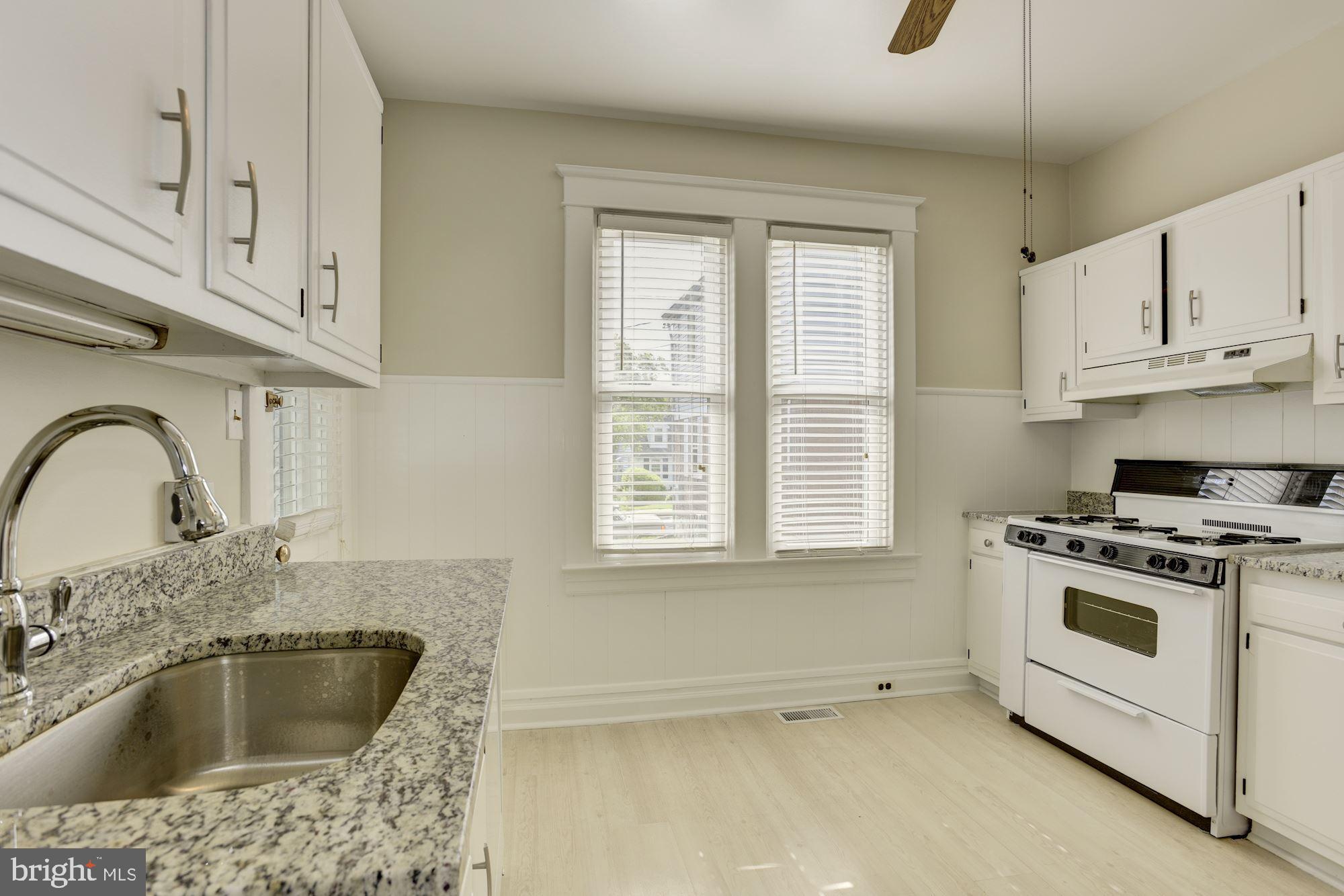 903 Arran Road Baltimore, MD 21239 - Photo 14 of 40 Granite counters. Painted cabinets.