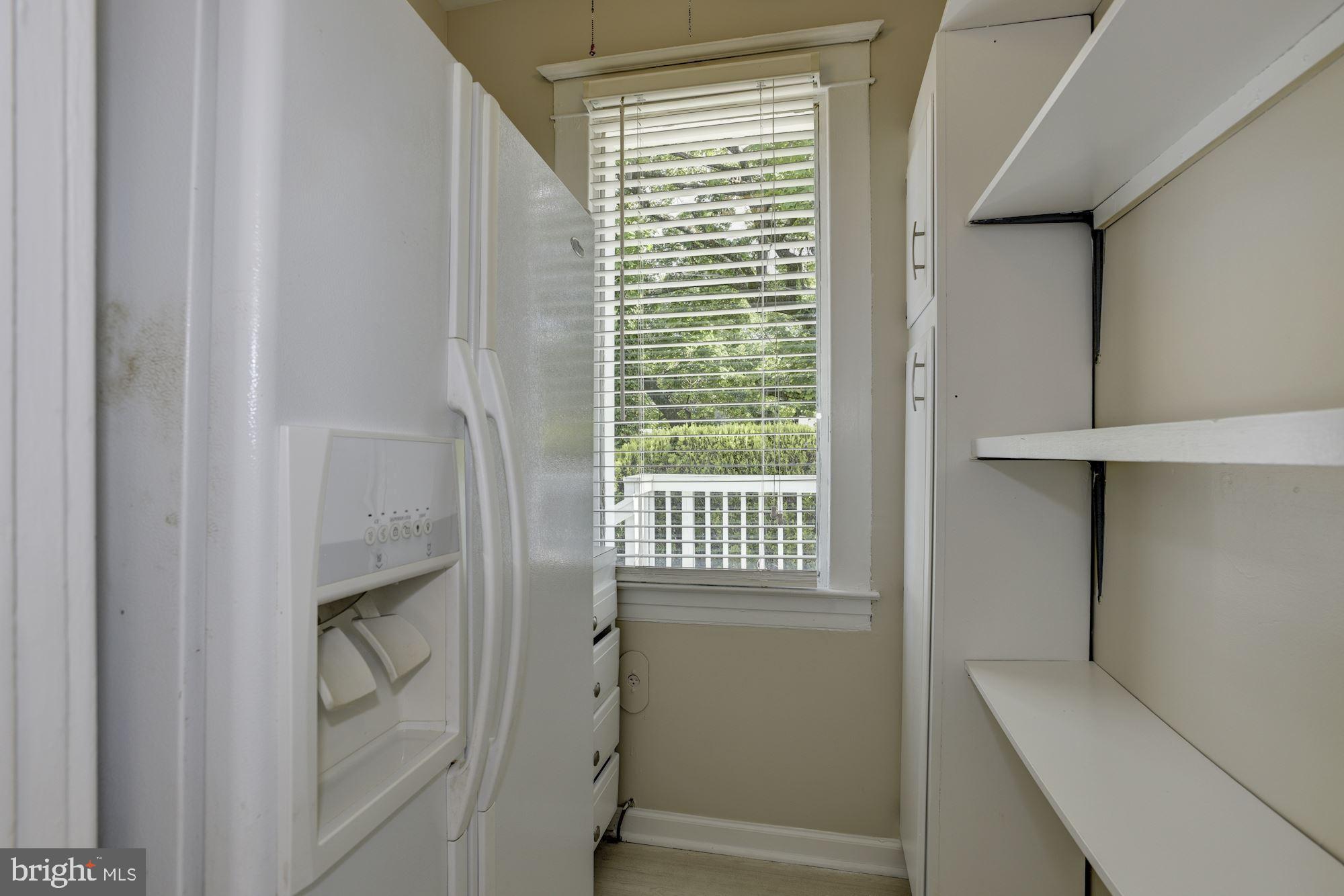 903 Arran Road Baltimore, MD 21239 - Photo 17 of 40 Pantry and refrigerator closet off kitchen.