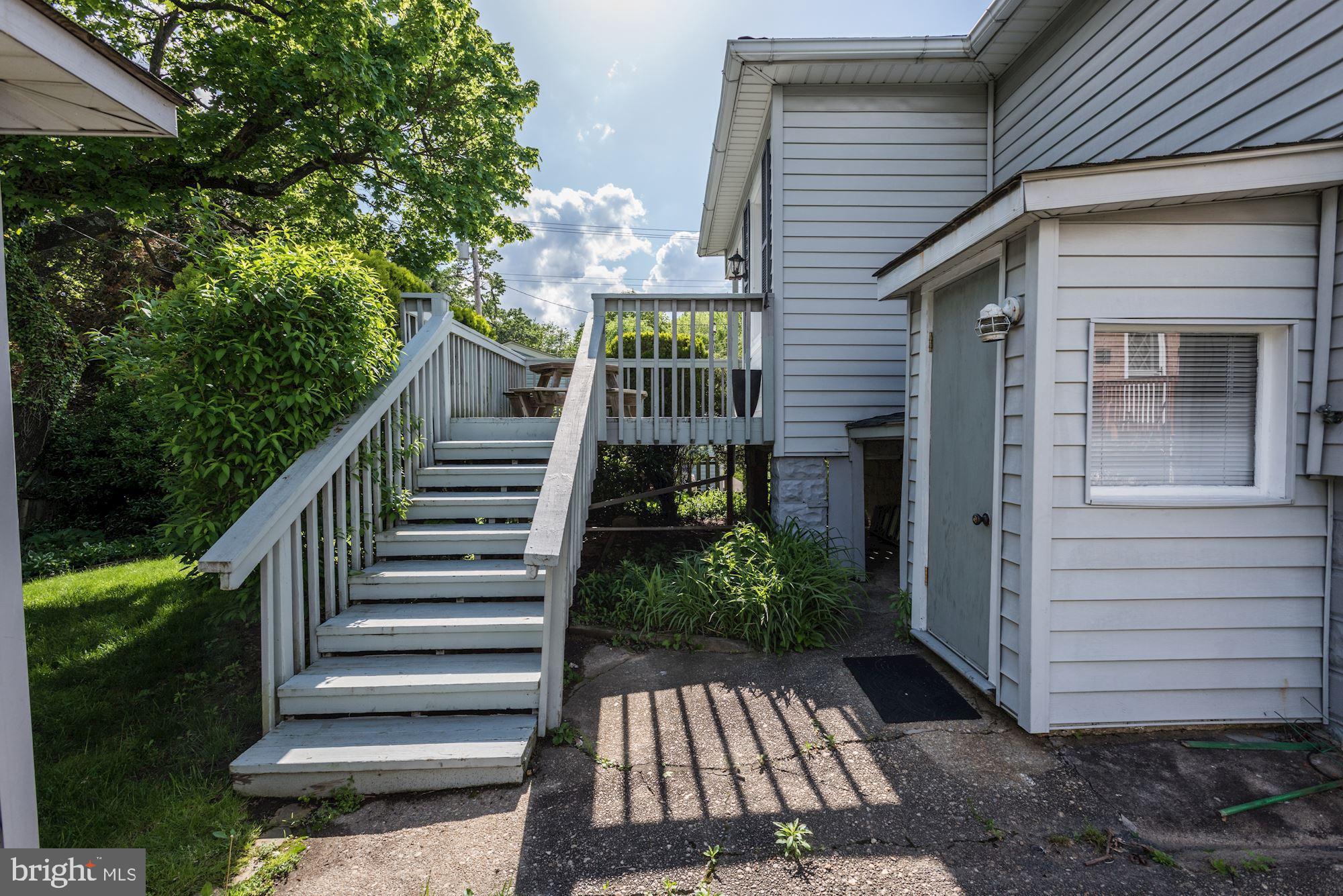 903 Arran Road Baltimore, MD 21239 - Photo 35 of 40 Deck stairs to driveway.