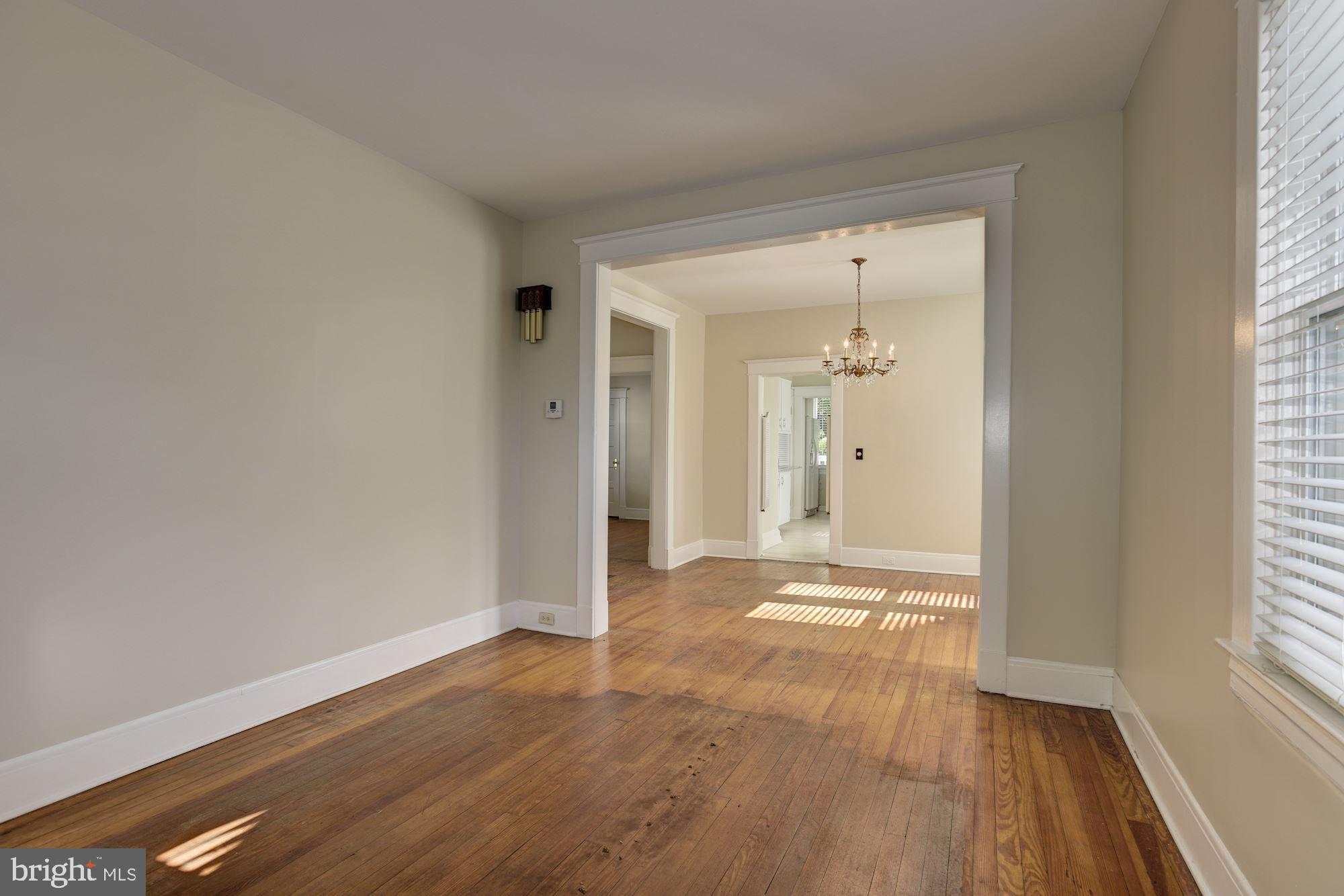 903 Arran Road Baltimore, MD 21239 - Photo 7 of 40 Living room leads to dining room