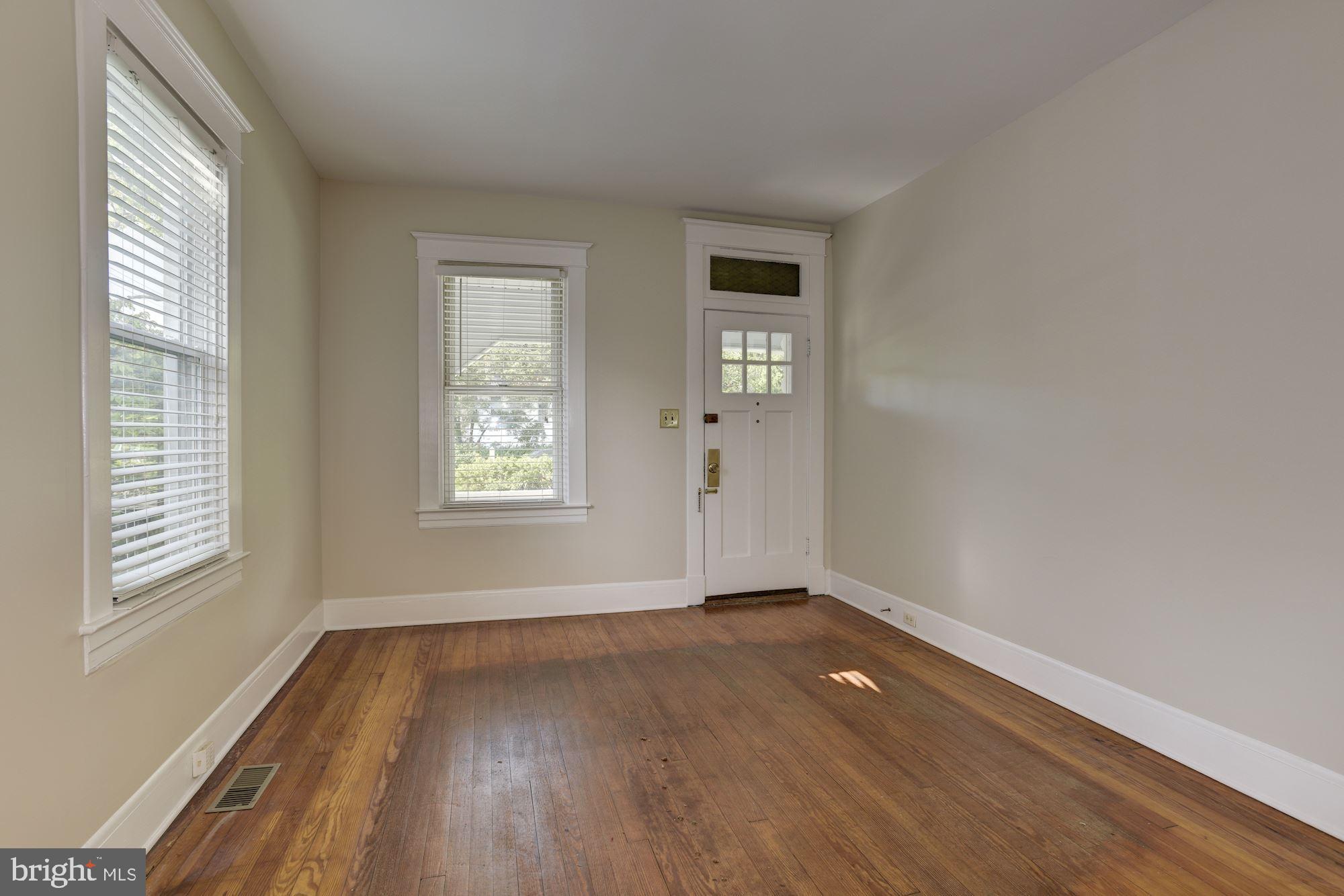 903 Arran Road Baltimore, MD 21239 - Photo 8 of 40 Cozy space. Floors appear to be heart pine.