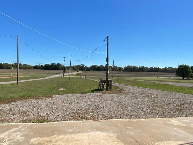 a view of a lake with a big yard