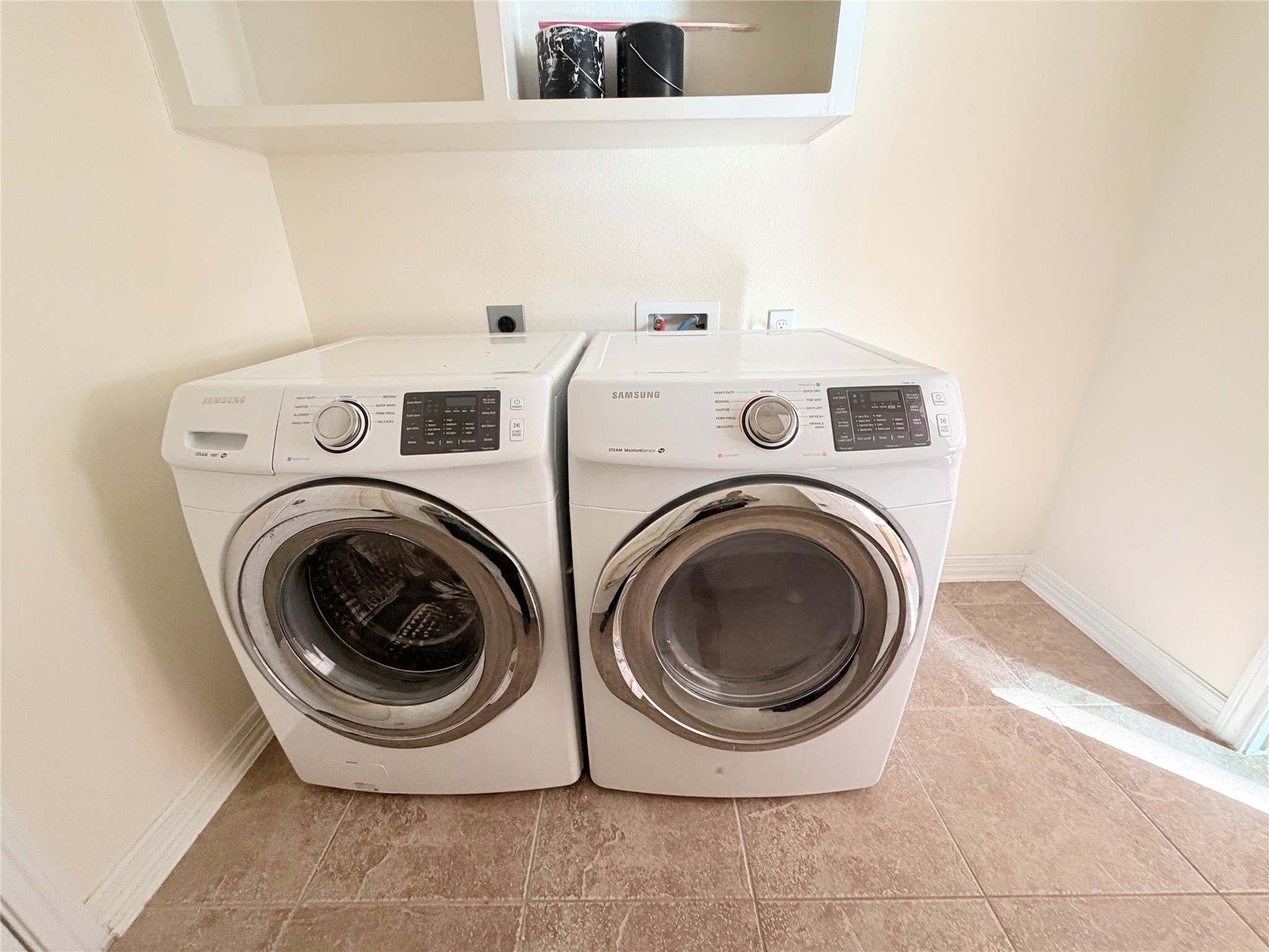 28015 Silverstream Court Fulshear, TX 77441 - Photo 10 of 33 a utility room with dryer and washer