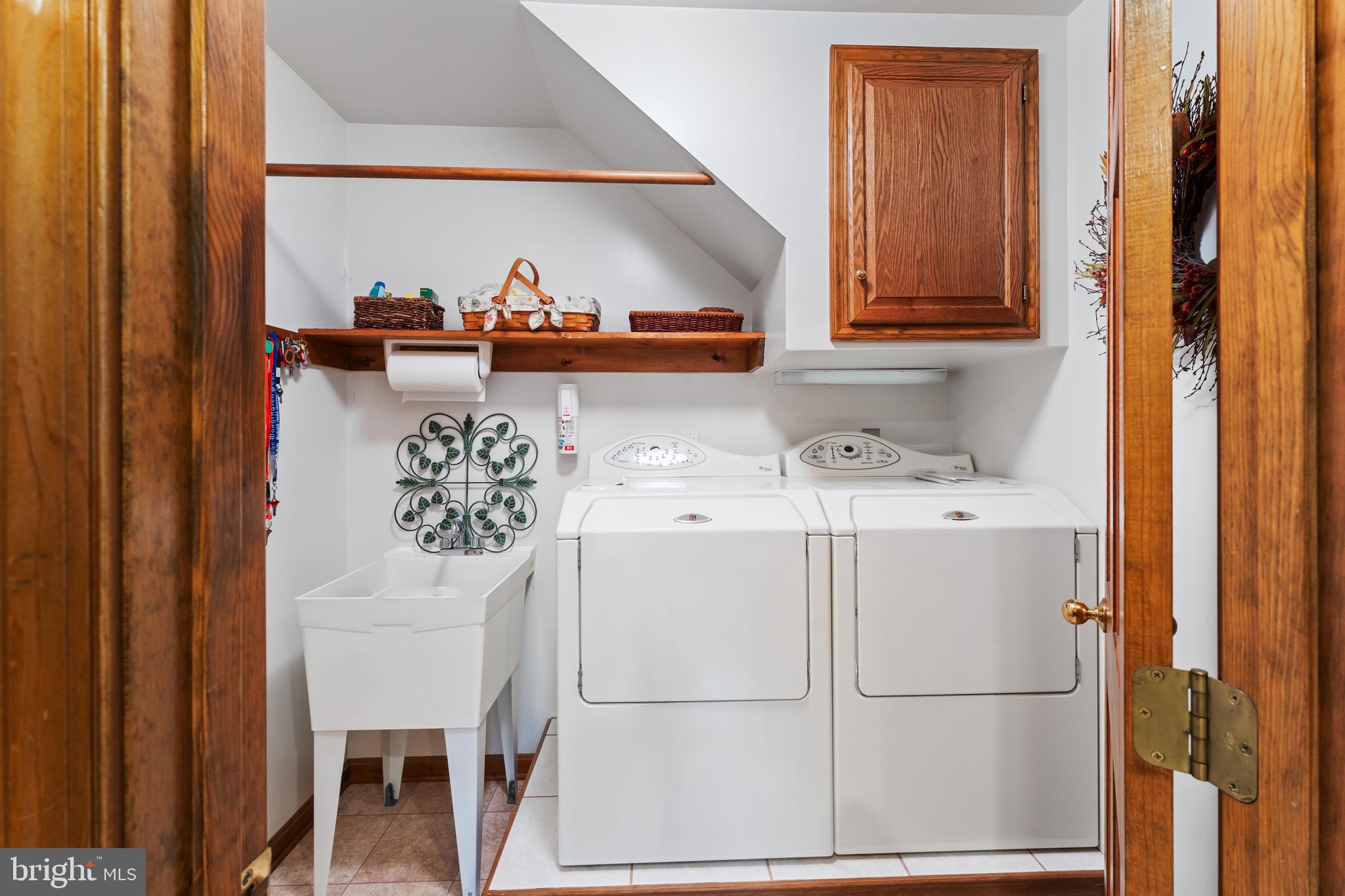 1433 Gilbert Road Arnold, MD 21012 - Photo 38 of 63 a white refrigerator freezer sitting inside of a kitchen