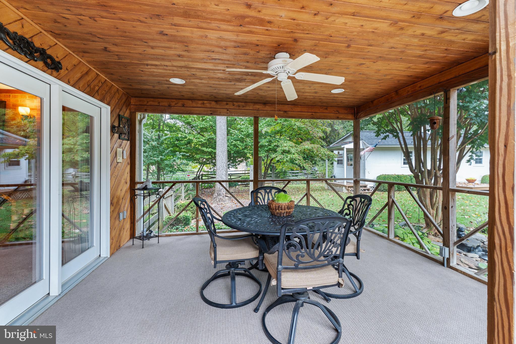 1433 Gilbert Road Arnold, MD 21012 - Photo 42 of 63 a view of a patio with table and chairs