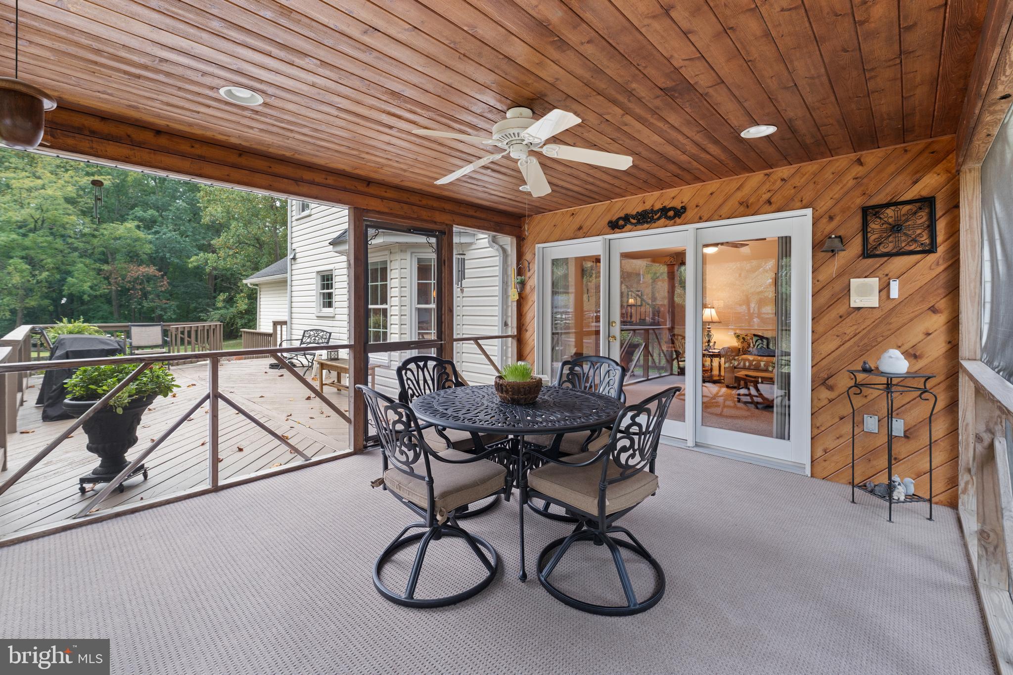 1433 Gilbert Road Arnold, MD 21012 - Photo 43 of 63 a view of a patio with table and chairs