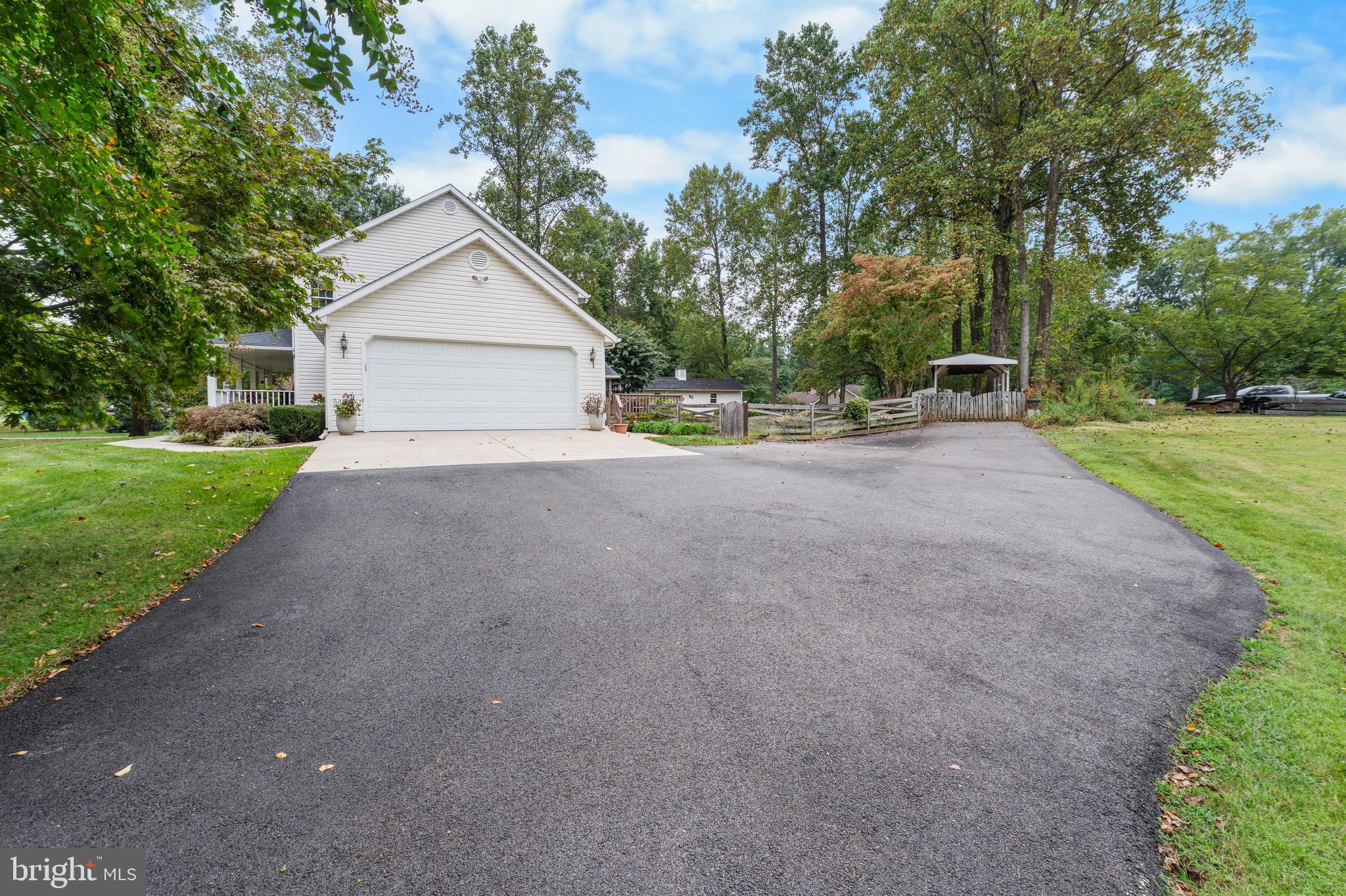 1433 Gilbert Road Arnold, MD 21012 - Photo 47 of 63 a view of a house with yard and a tree