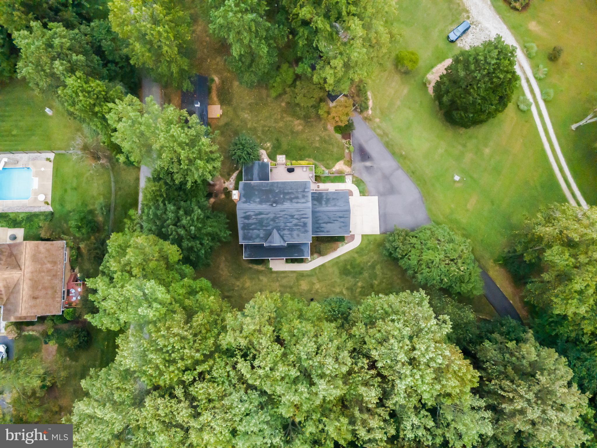 1433 Gilbert Road Arnold, MD 21012 - Photo 56 of 63 an aerial view of a house with pool yard and outdoor seating