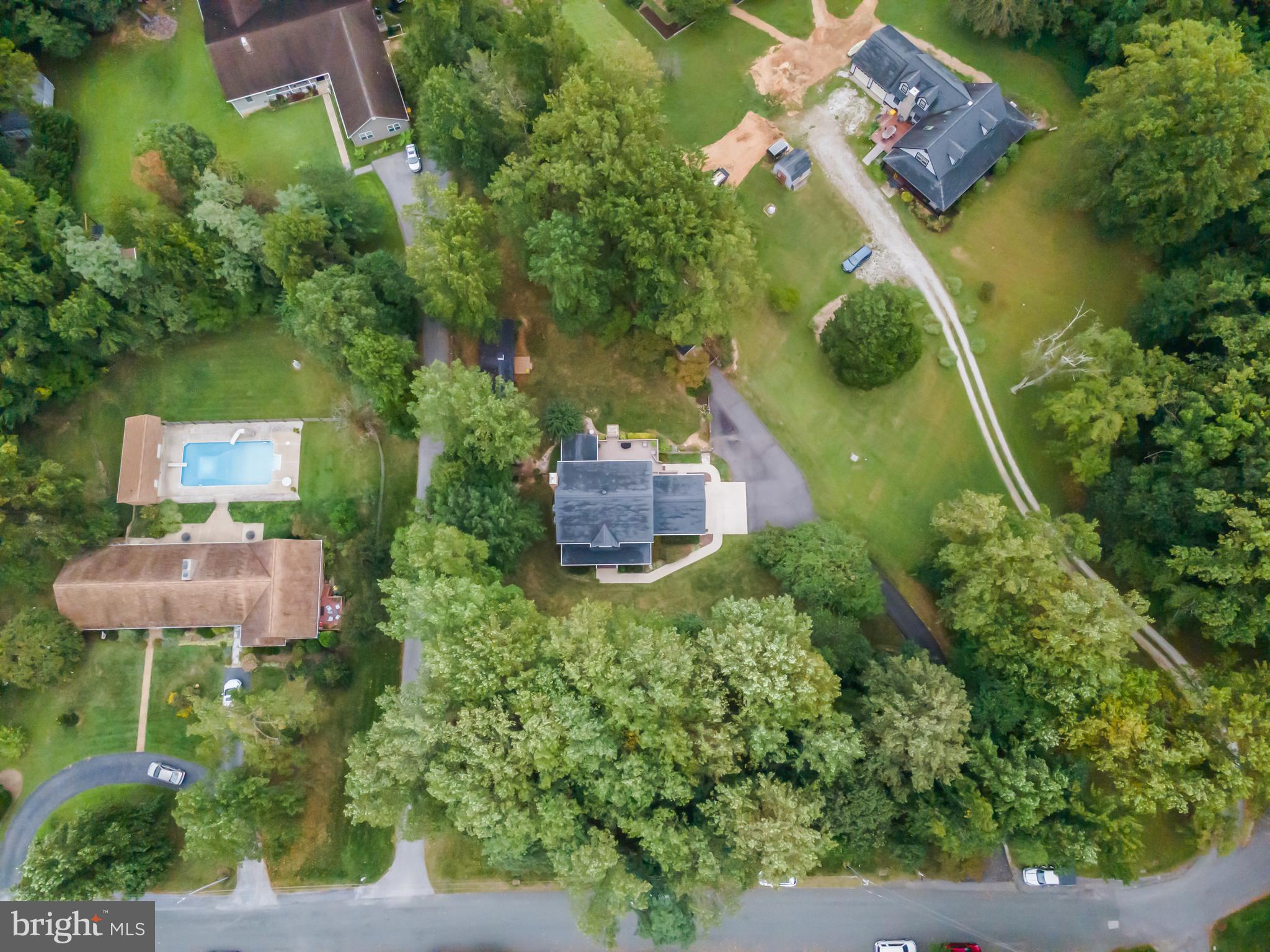 1433 Gilbert Road Arnold, MD 21012 - Photo 58 of 63 an aerial view of a house with a yard and outdoor seating