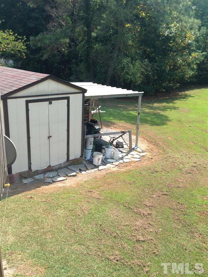 6327 Sisk Culbreth Road Godwin, NC 28344 - Photo 22 of 23 a view of a backyard