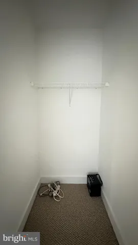 a bathroom with a toilet a sink and shower