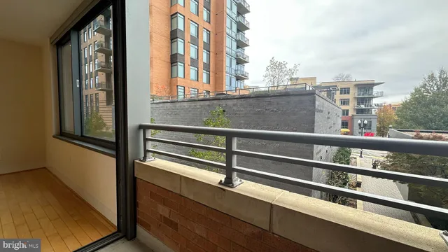 a view of balcony with a potted plant