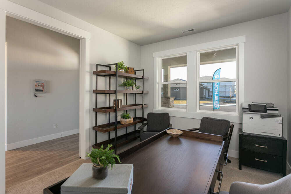 3803 Northeast Oakside Loop Bend, OR 97701 - Photo 5 of 22 a living room with furniture and a potted plant