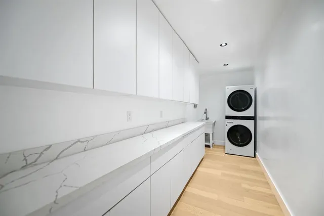 a view of a hallway with a large window