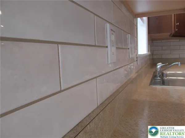 a utility room with cabinets