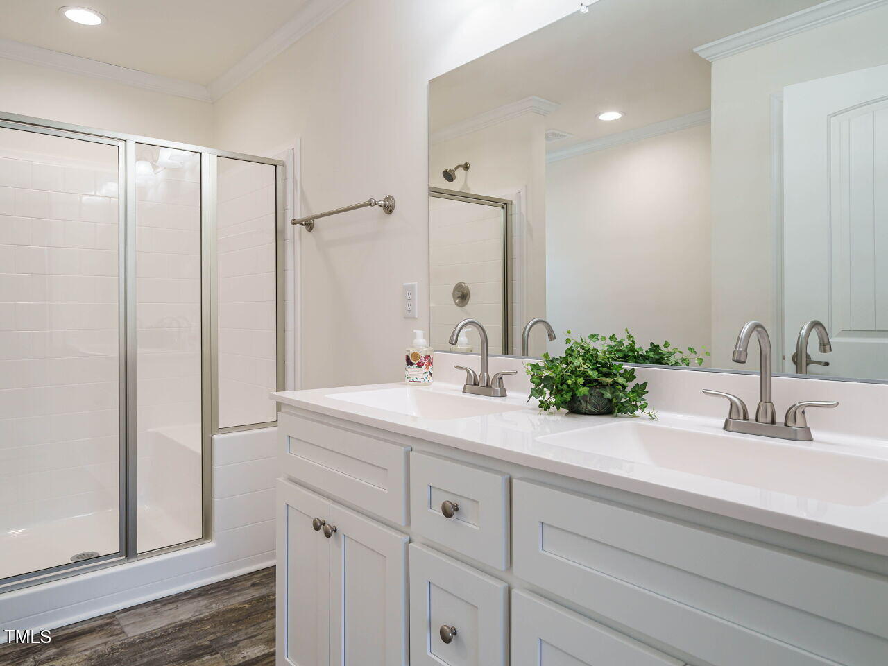 3050 Bennett Siler City Road Bennett, NC 27208 - Photo 21 of 40 a bathroom with a sink and a mirror