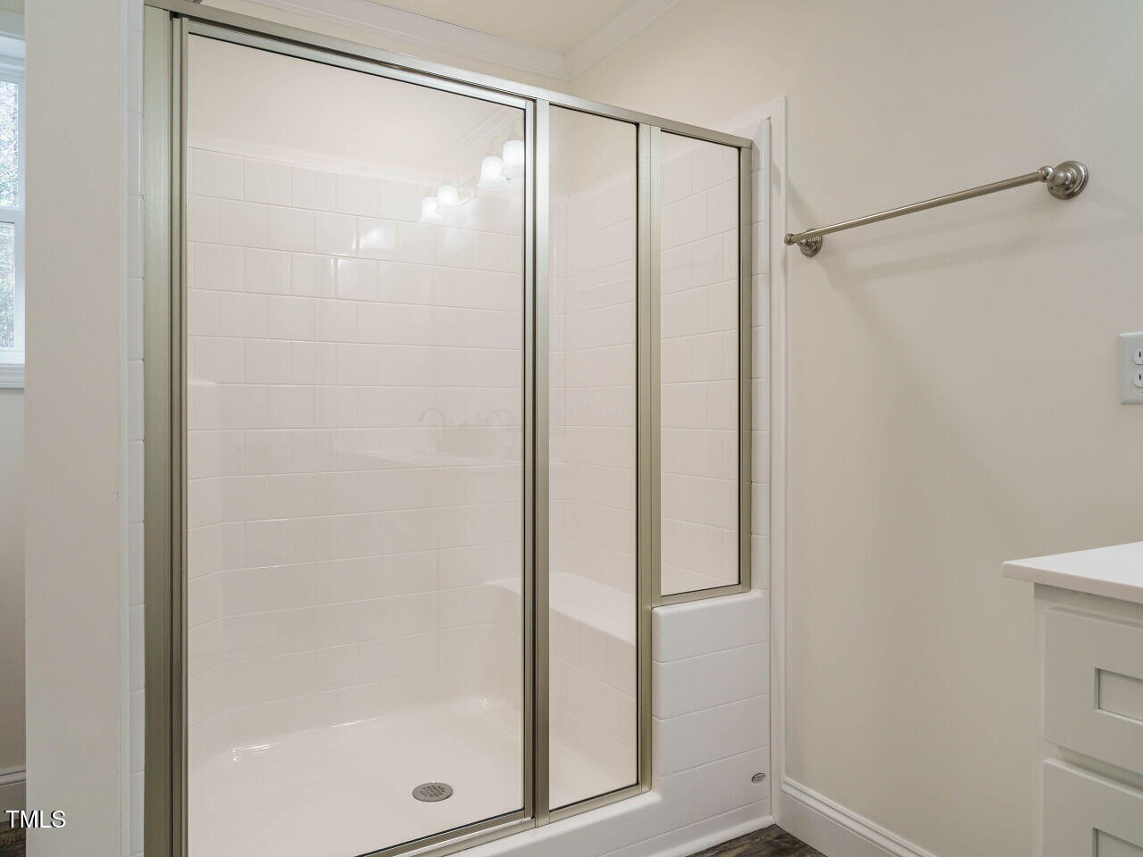 3050 Bennett Siler City Road Bennett, NC 27208 - Photo 22 of 40 a bathroom with a glass shower door