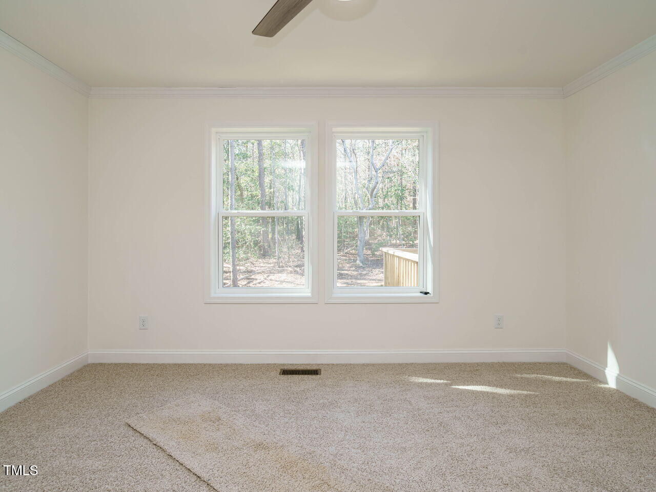 3050 Bennett Siler City Road Bennett, NC 27208 - Photo 27 of 40 an empty room with a window