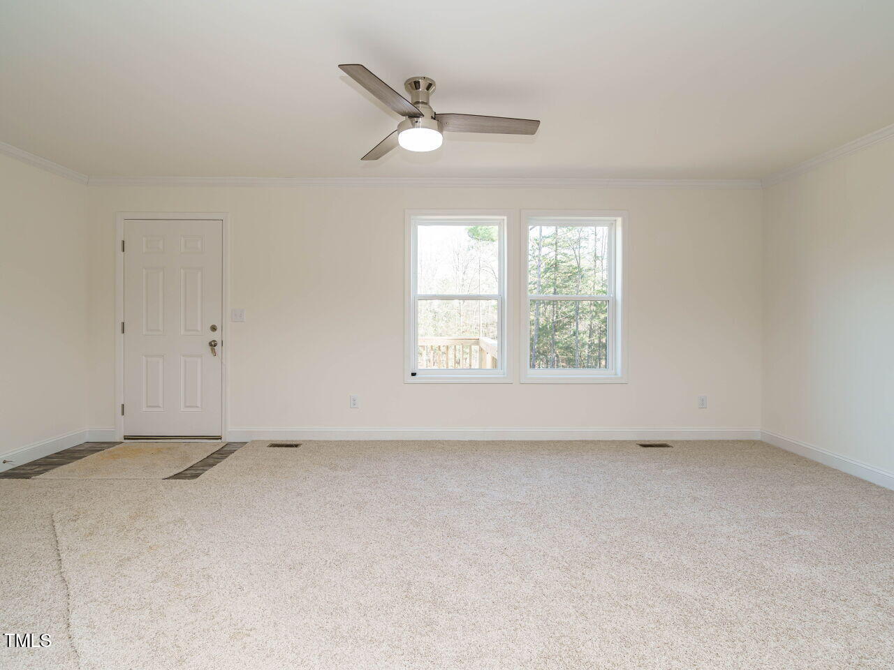 3050 Bennett Siler City Road Bennett, NC 27208 - Photo 6 of 40 an empty room with a window