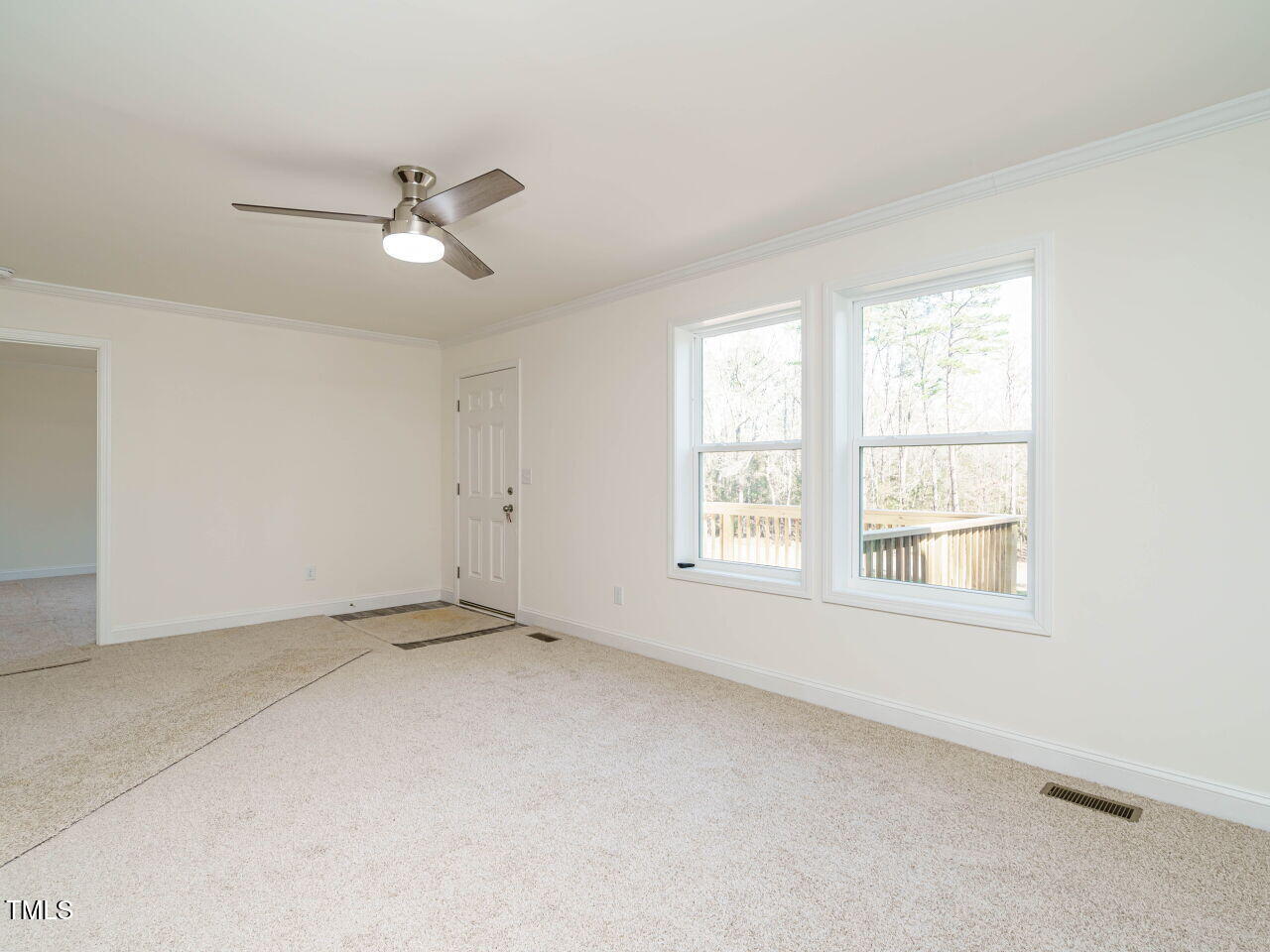 3050 Bennett Siler City Road Bennett, NC 27208 - Photo 7 of 40 a view of an empty room with a window