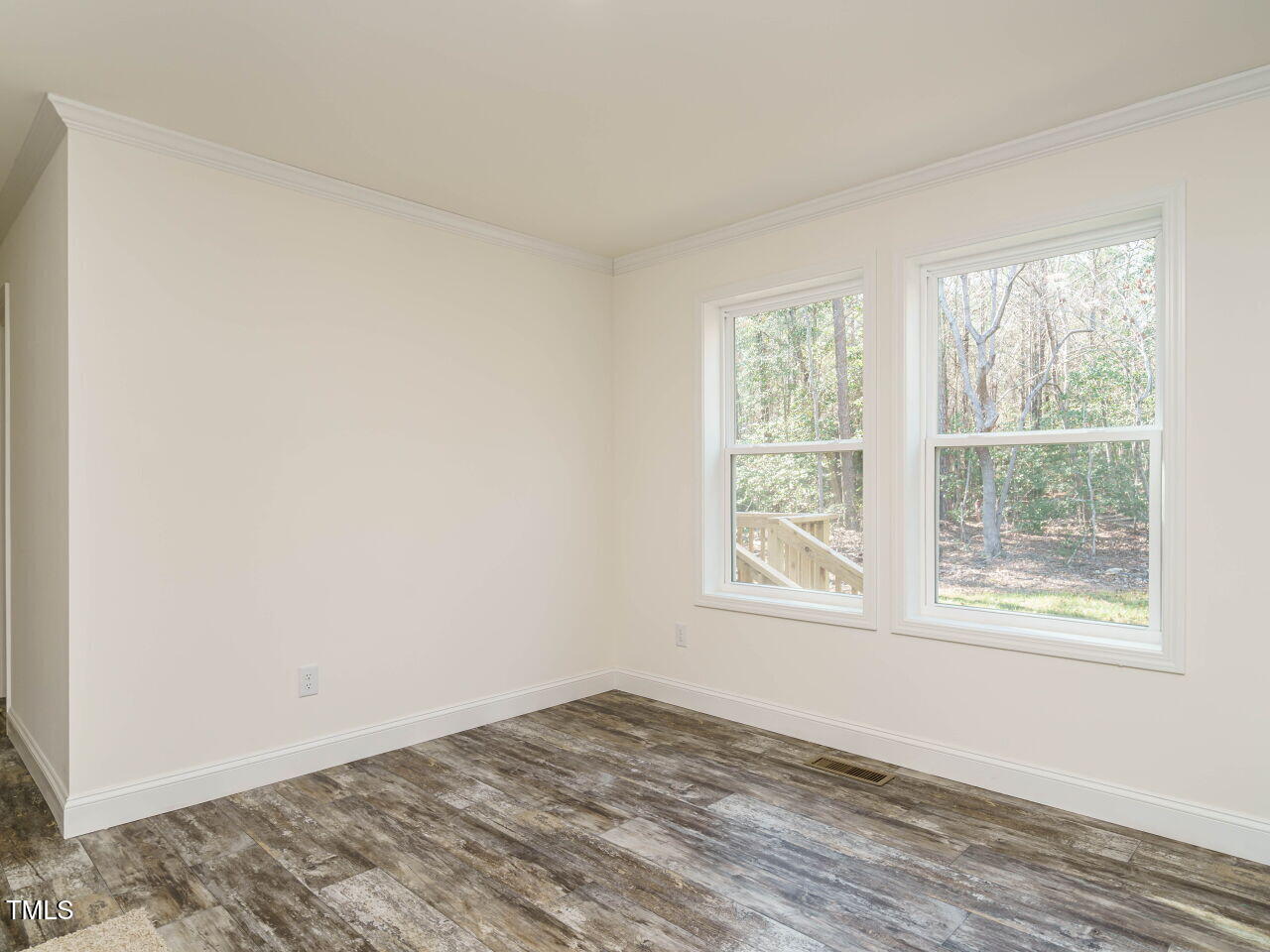 3050 Bennett Siler City Road Bennett, NC 27208 - Photo 10 of 40 a view of an empty room and window