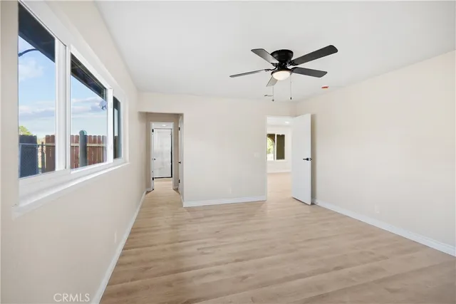 a bathroom with a shower and a toilet