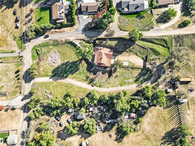 an aerial view of residential house with outdoor space