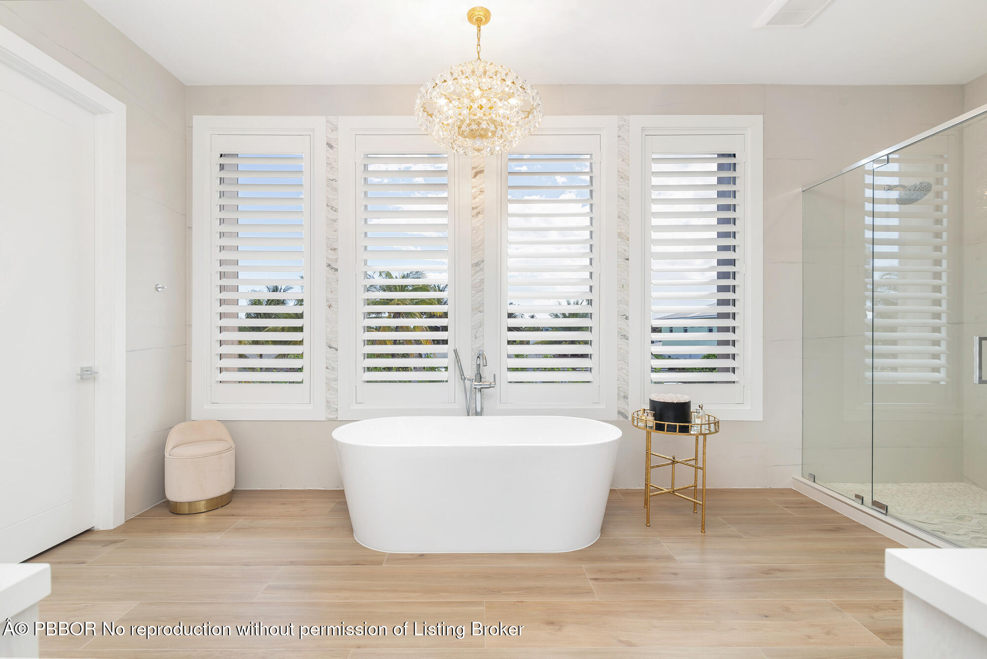 183 Arlington Road West Palm Beach, FL 33405 - Photo 15 of 34 a white bath tub sitting next to a window