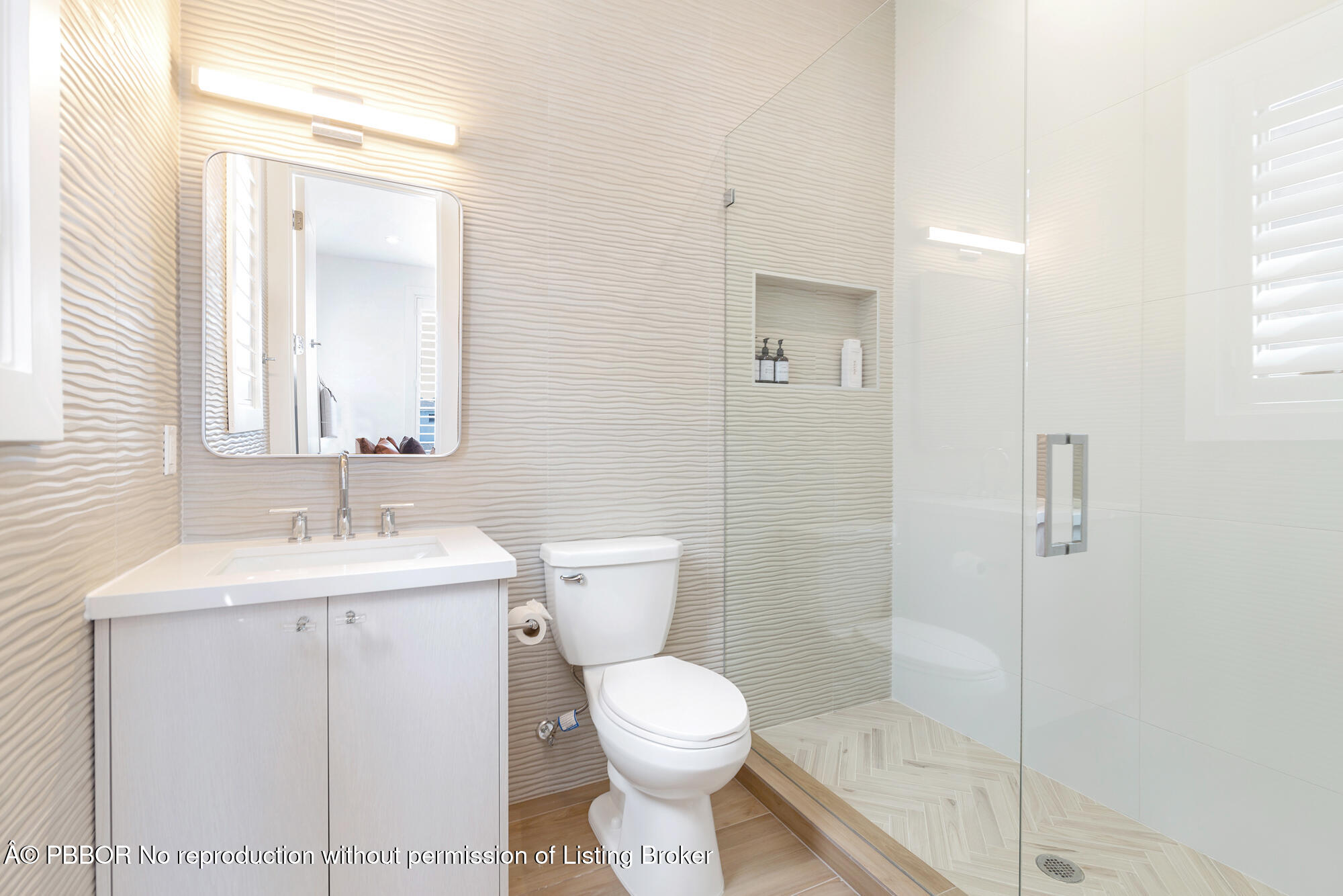 183 Arlington Road West Palm Beach, FL 33405 - Photo 24 of 34 a bathroom with a toilet sink and shower