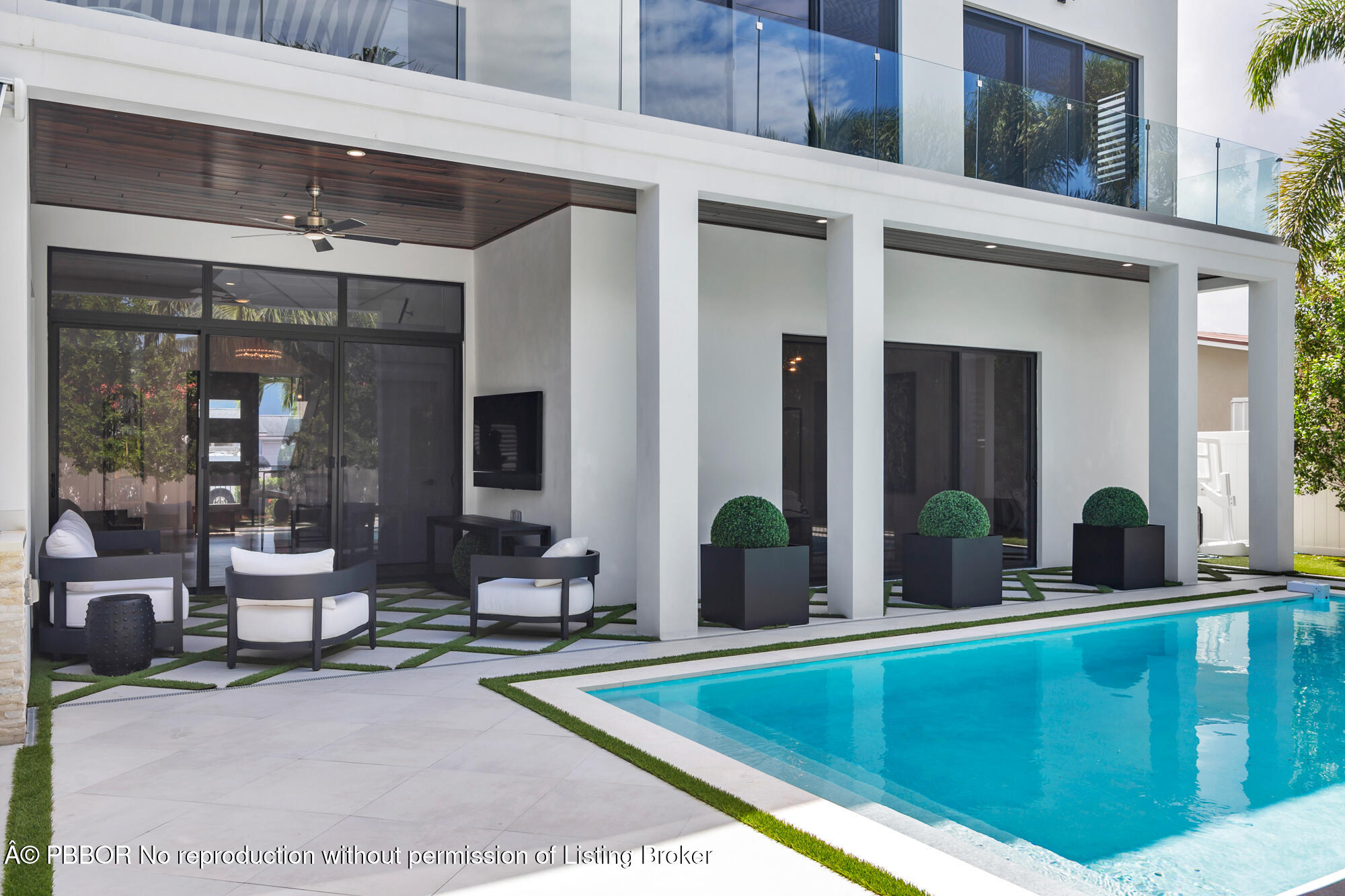 183 Arlington Road West Palm Beach, FL 33405 - Photo 28 of 34 a view of swimming pool with outdoor seating