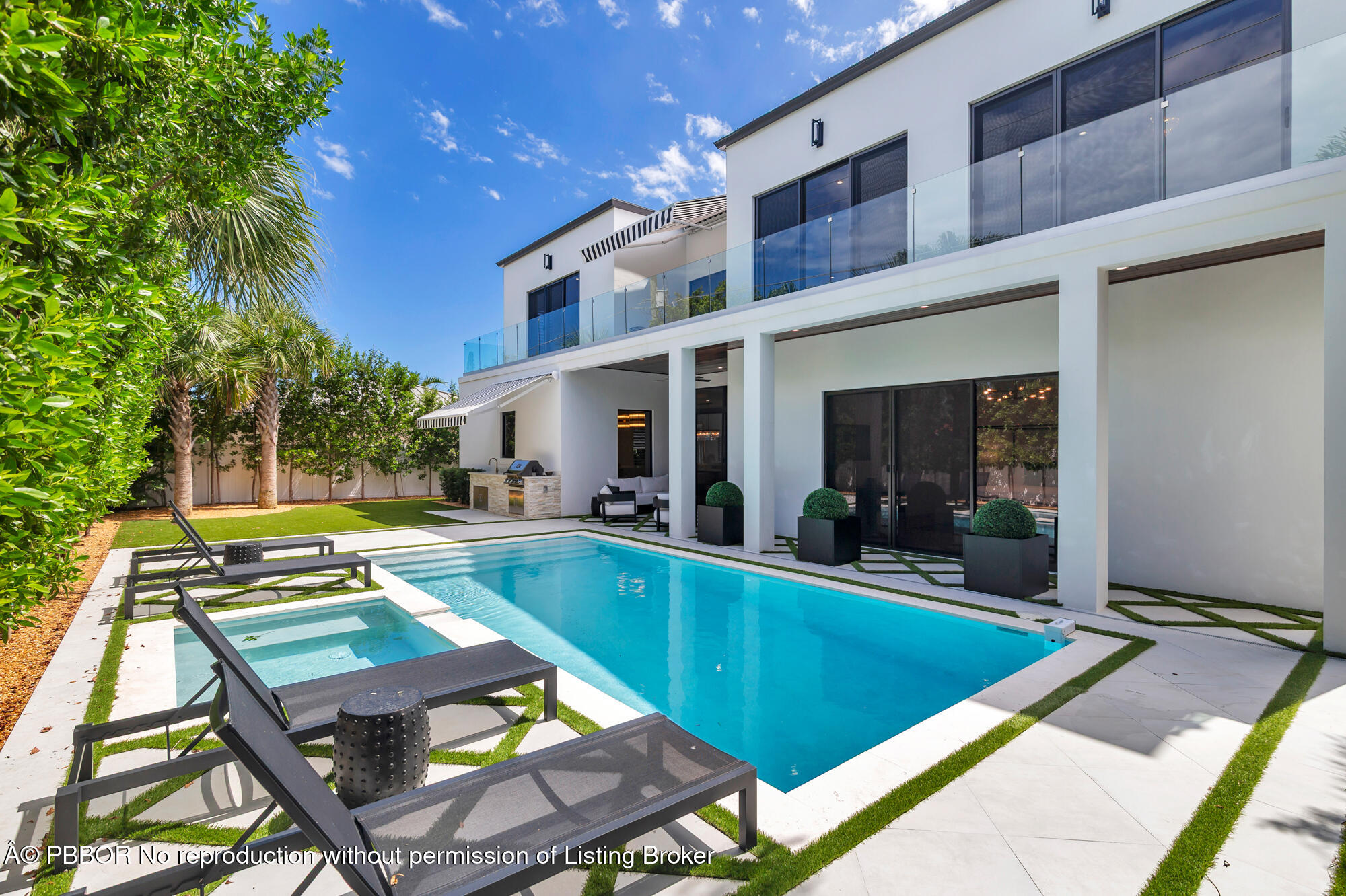 183 Arlington Road West Palm Beach, FL 33405 - Photo 29 of 34 a view of a house with pool and chairs