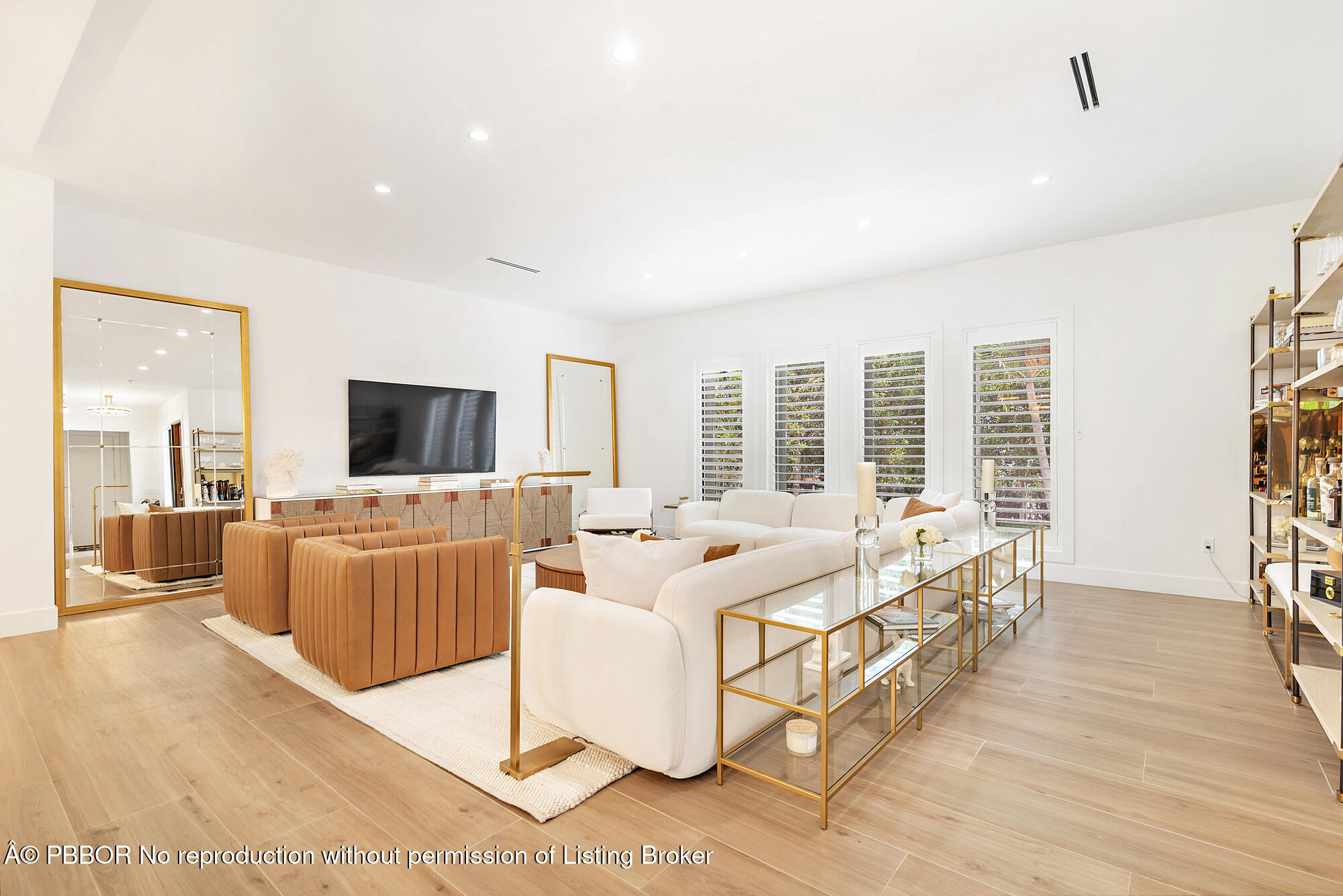 183 Arlington Road West Palm Beach, FL 33405 - Photo 3 of 34 a living room with furniture and a flat screen tv