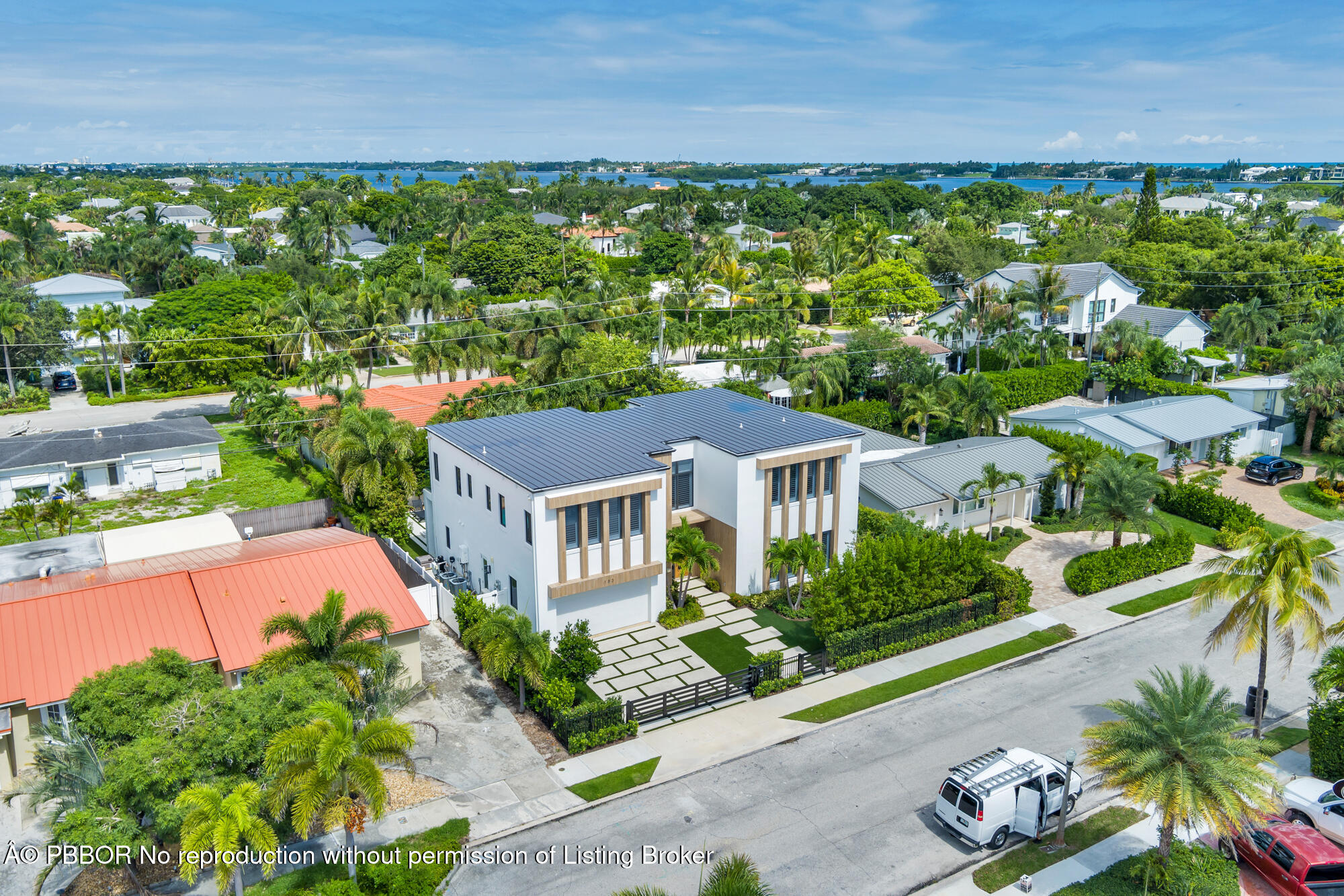 183 Arlington Road West Palm Beach, FL 33405 - Photo 32 of 34 an aerial view of a house with a yard and lake view