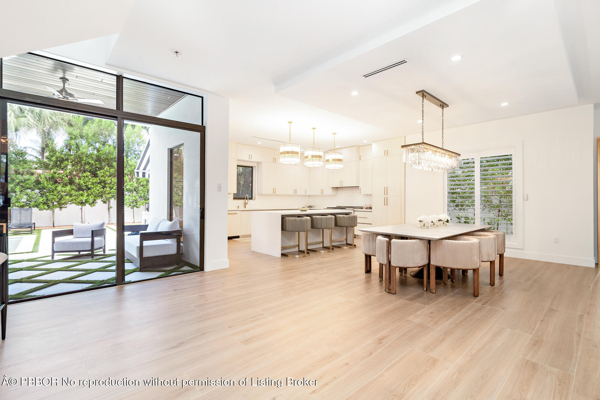 183 Arlington Road West Palm Beach, FL 33405 - Photo 7 of 34 a living room with furniture and a large window