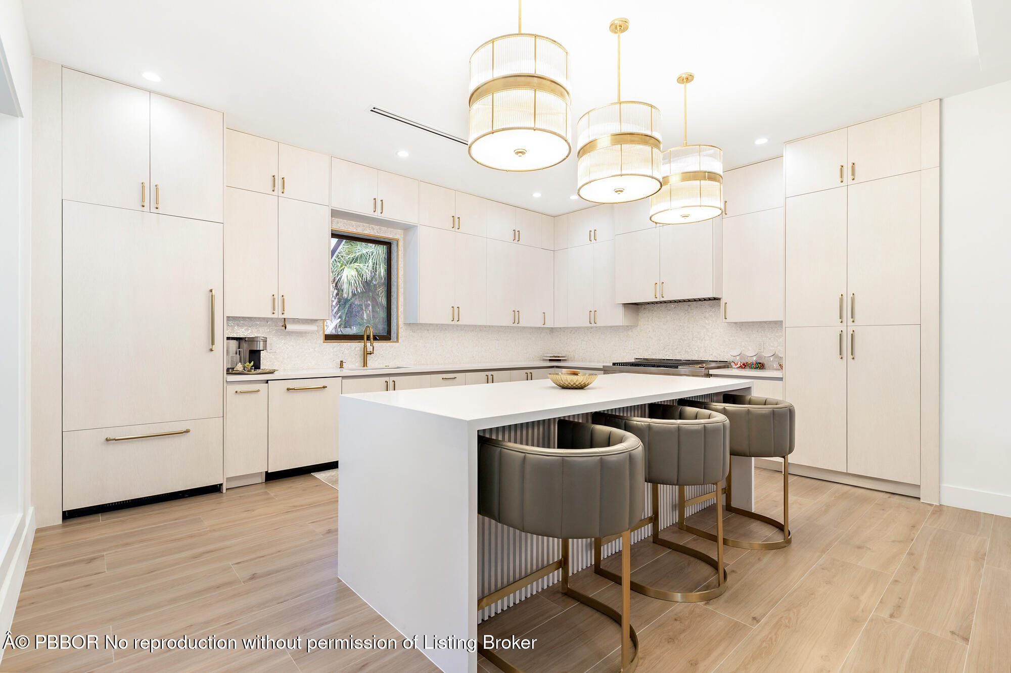 183 Arlington Road West Palm Beach, FL 33405 - Photo 9 of 34 a kitchen with cabinets a sink and appliances