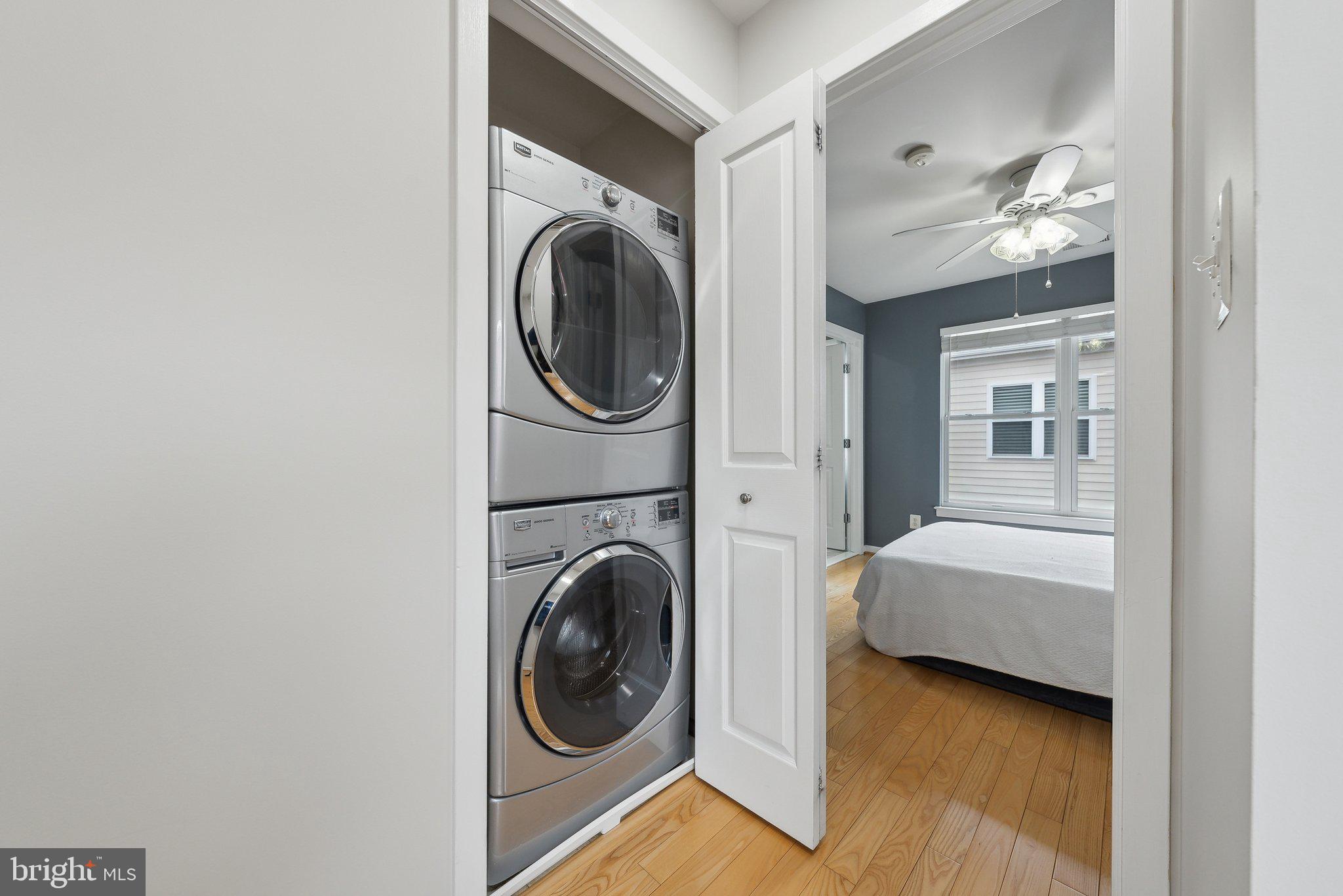 2136 12th Place Northwest Washington, DC 20009 - Photo 19 of 32 a view of a hallway with washer and dryer