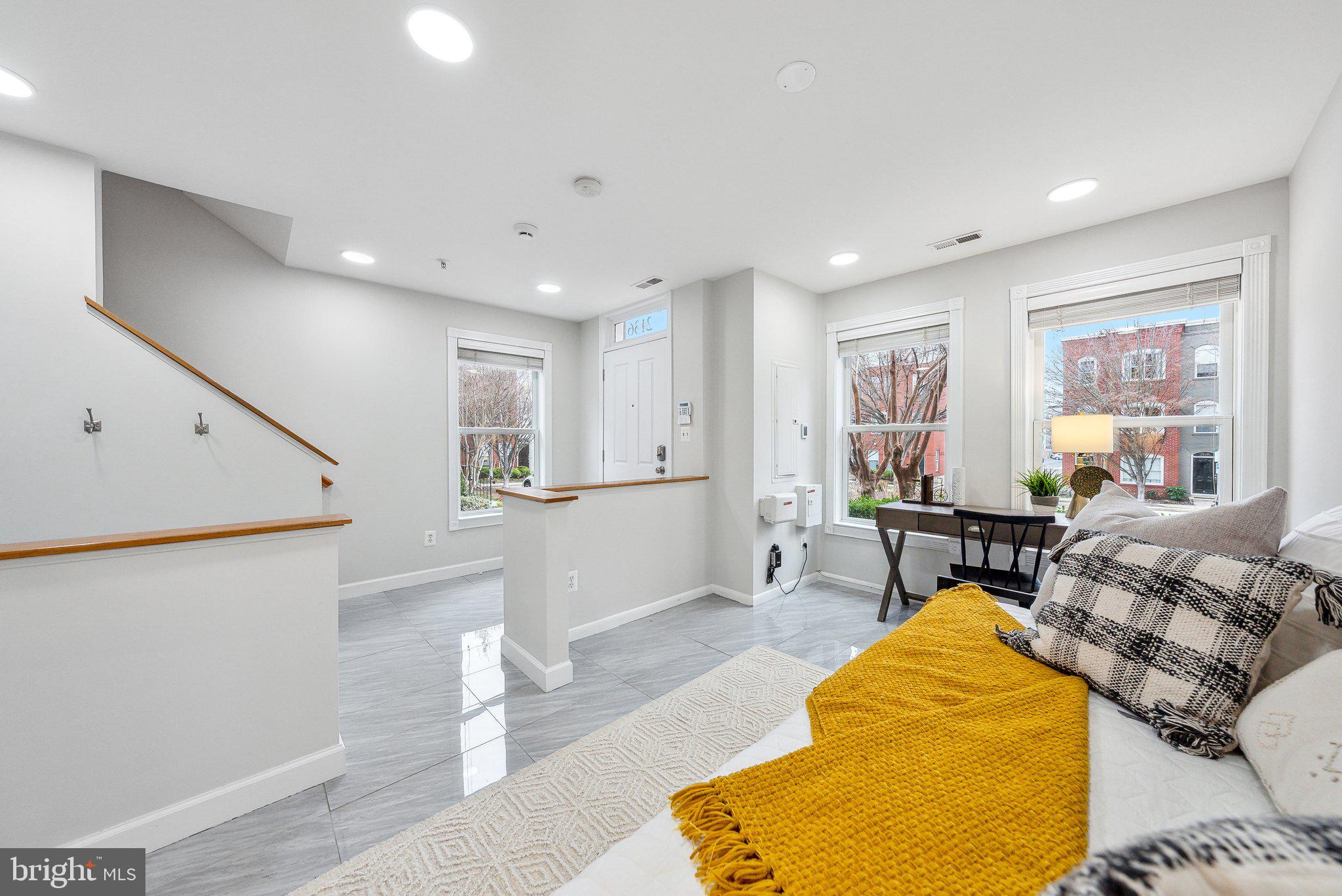 2136 12th Place Northwest Washington, DC 20009 - Photo 20 of 32 a living room with furniture and a large window
