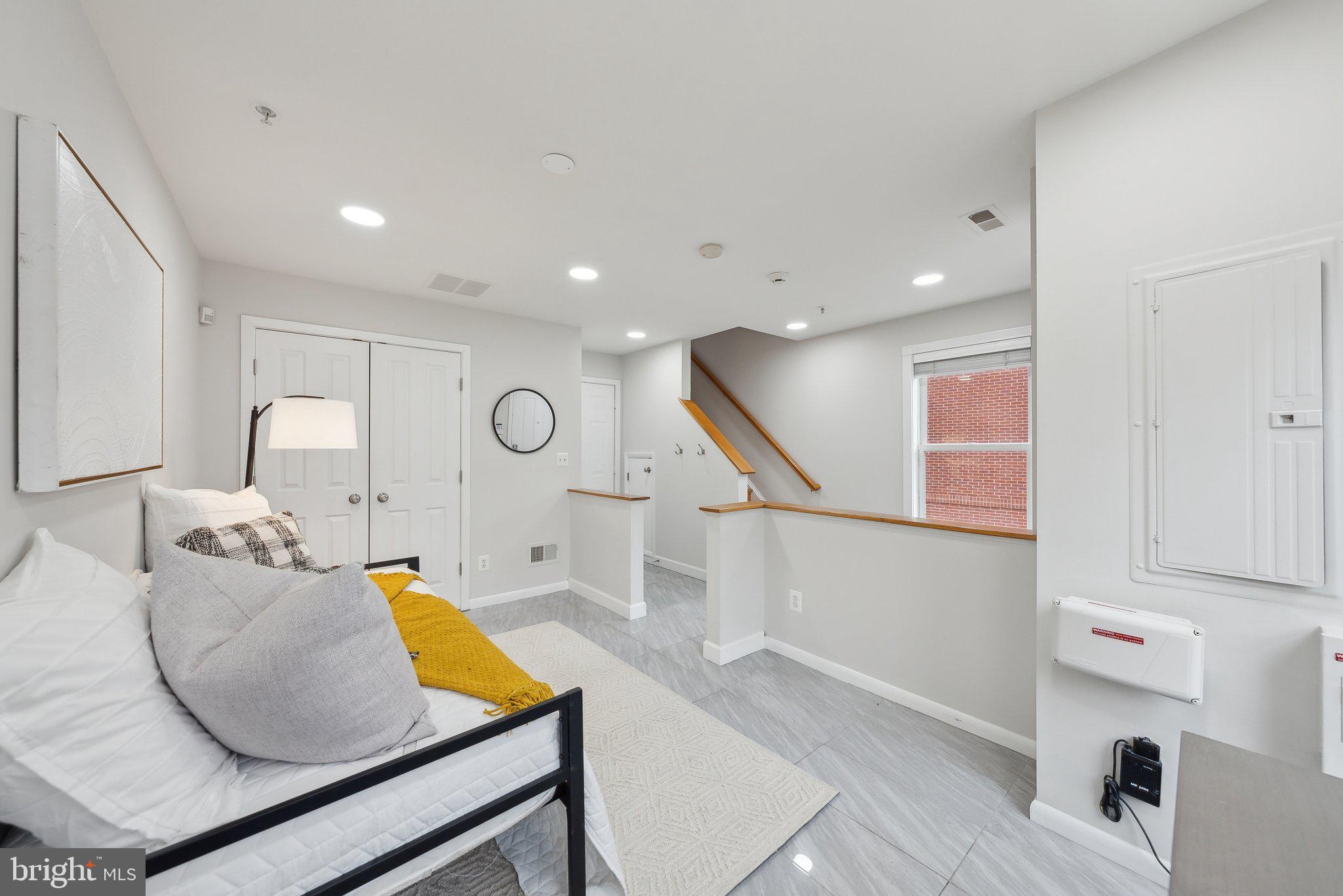 2136 12th Place Northwest Washington, DC 20009 - Photo 22 of 32 a living room with furniture and a wooden floor