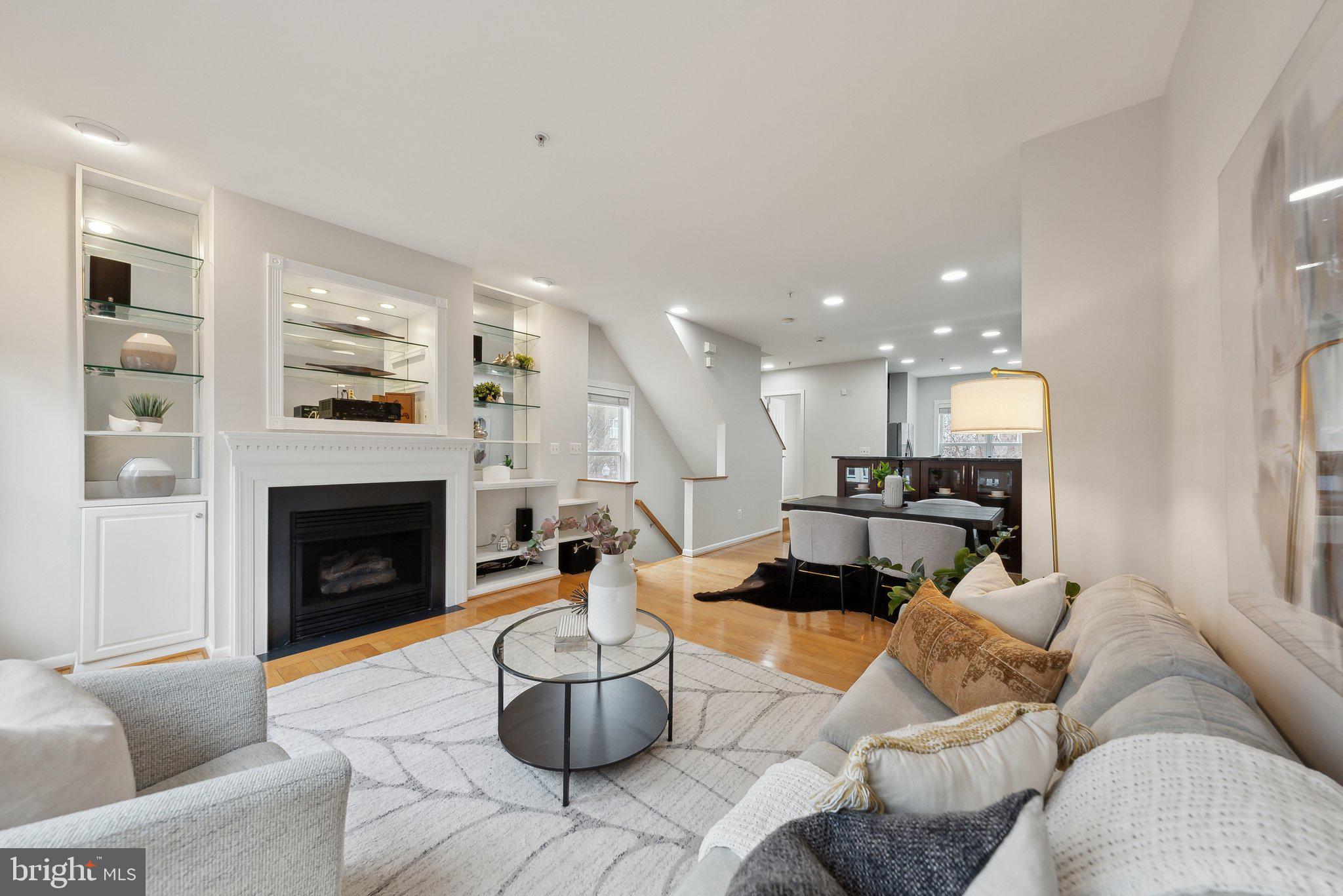 2136 12th Place Northwest Washington, DC 20009 - Photo 3 of 32 a living room with furniture and a fireplace