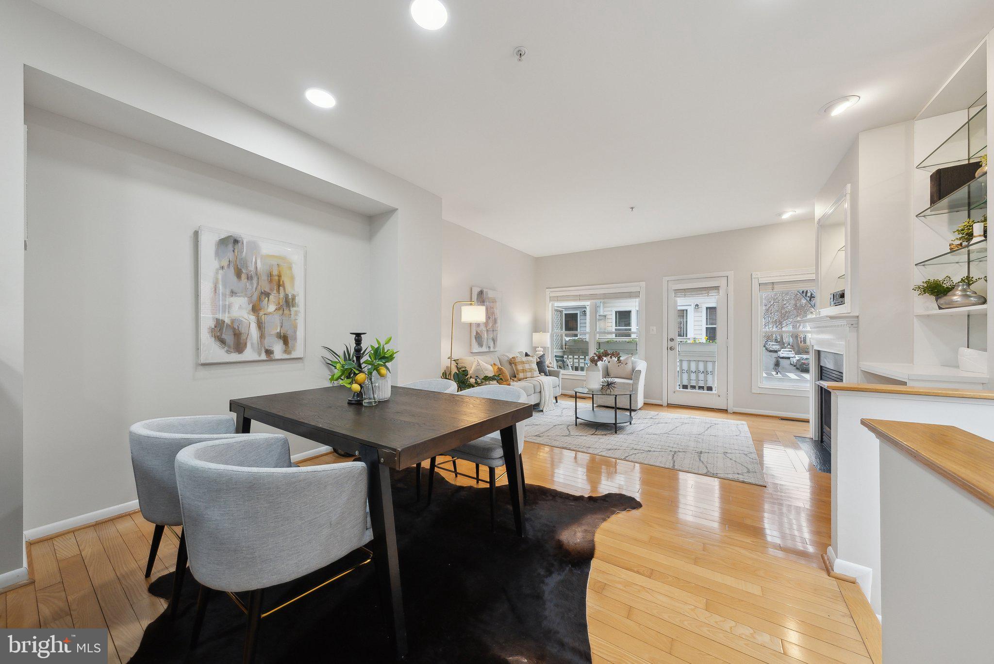 2136 12th Place Northwest Washington, DC 20009 - Photo 4 of 32 a dining room with furniture and wooden floor