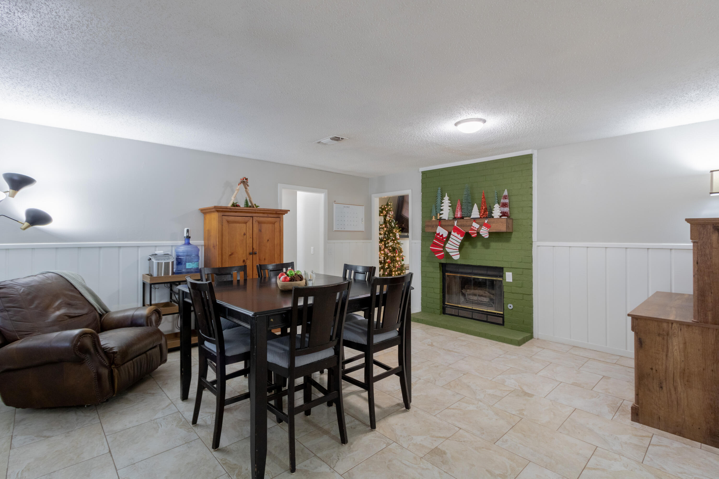 4404 49th Street Lubbock, TX 79414 - Photo 20 of 34 a view of a livingroom with furniture and a flat screen tv