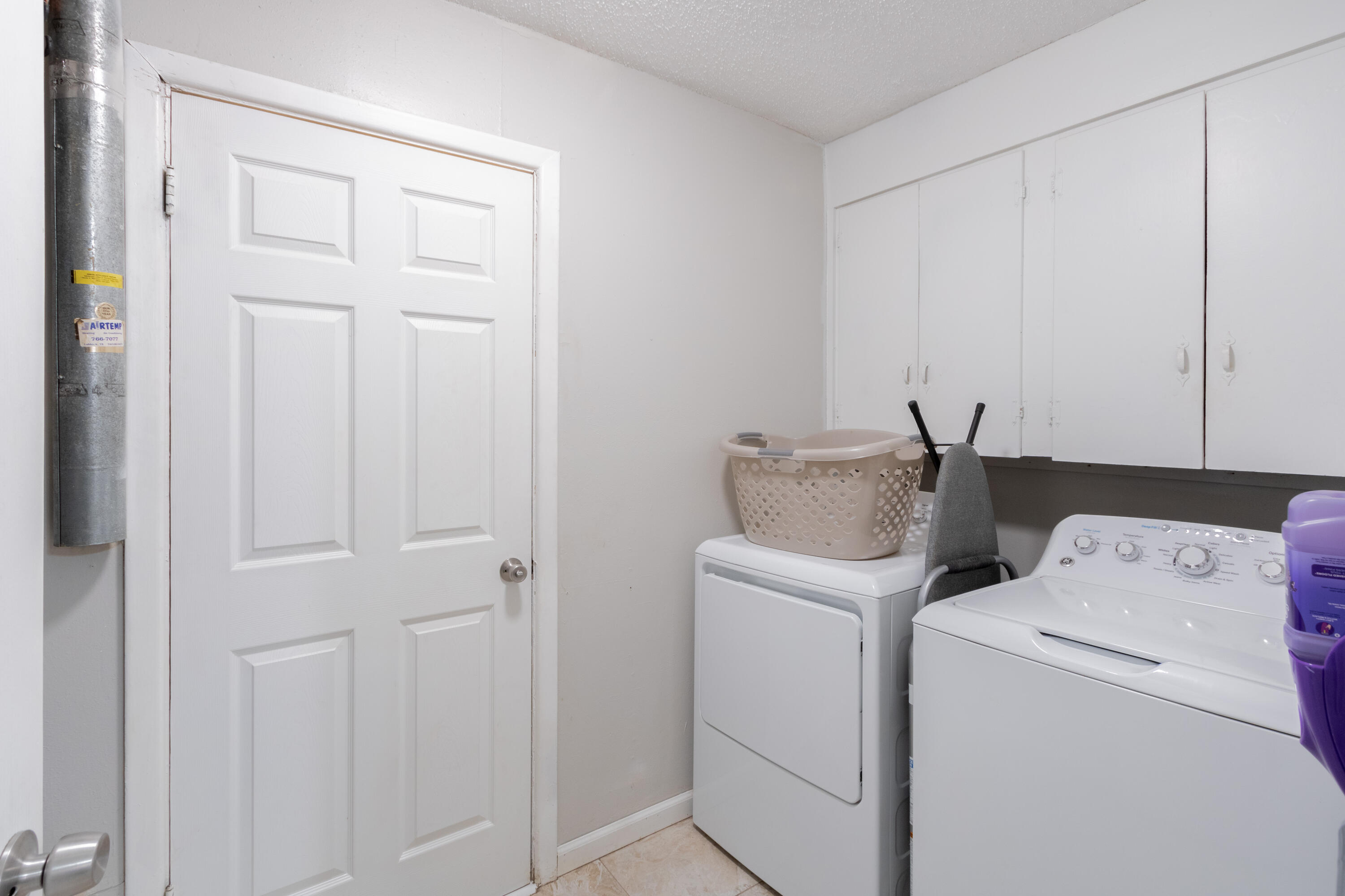 4404 49th Street Lubbock, TX 79414 - Photo 27 of 34 a utility room with dryer and washer