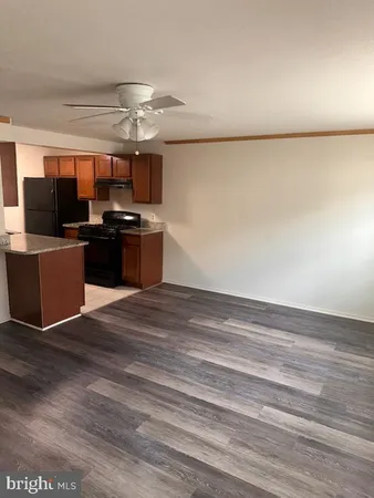 a view of kitchen and microwave