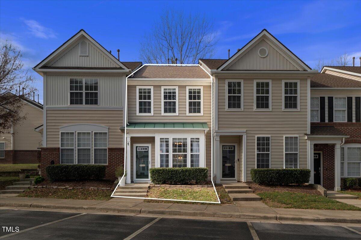 4533 Sugarbend Way Raleigh, NC 27606 - Photo 2 of 37 a front view of a house with a yard