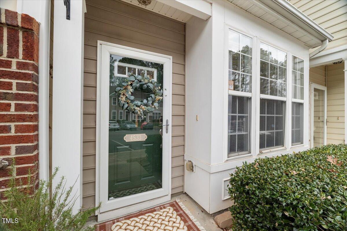 4533 Sugarbend Way Raleigh, NC 27606 - Photo 3 of 37 a view of front door of house and front door