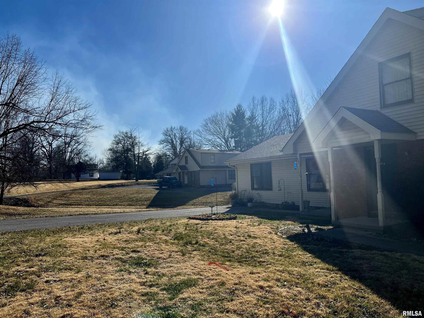 1609 South 22nd Street Herrin, IL 62948 - Photo 3 of 12 a view of a yard with an house