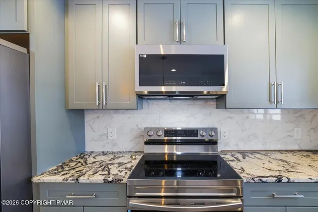a kitchen with a sink and a window