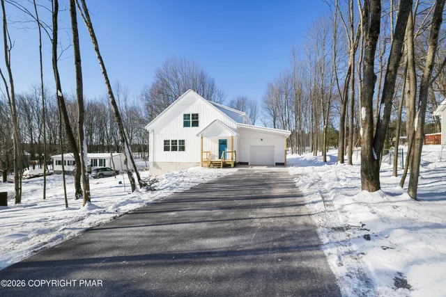 a view of a backyard of the house
