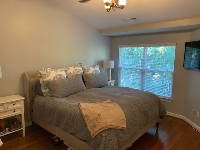 8734 Cypress Grove Run Raleigh, NC 27612 - Photo 15 of 30 The master bedroom has a vaulted ceiling, fan and beautiful hardwoods. Master Bedroom