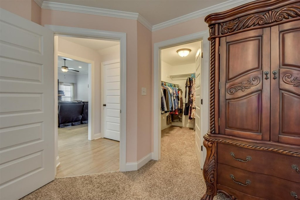 4419 Raleigh Drive Grovetown, GA 30813 - Photo 23 of 40 Owner's closet and door that leads to hallway and